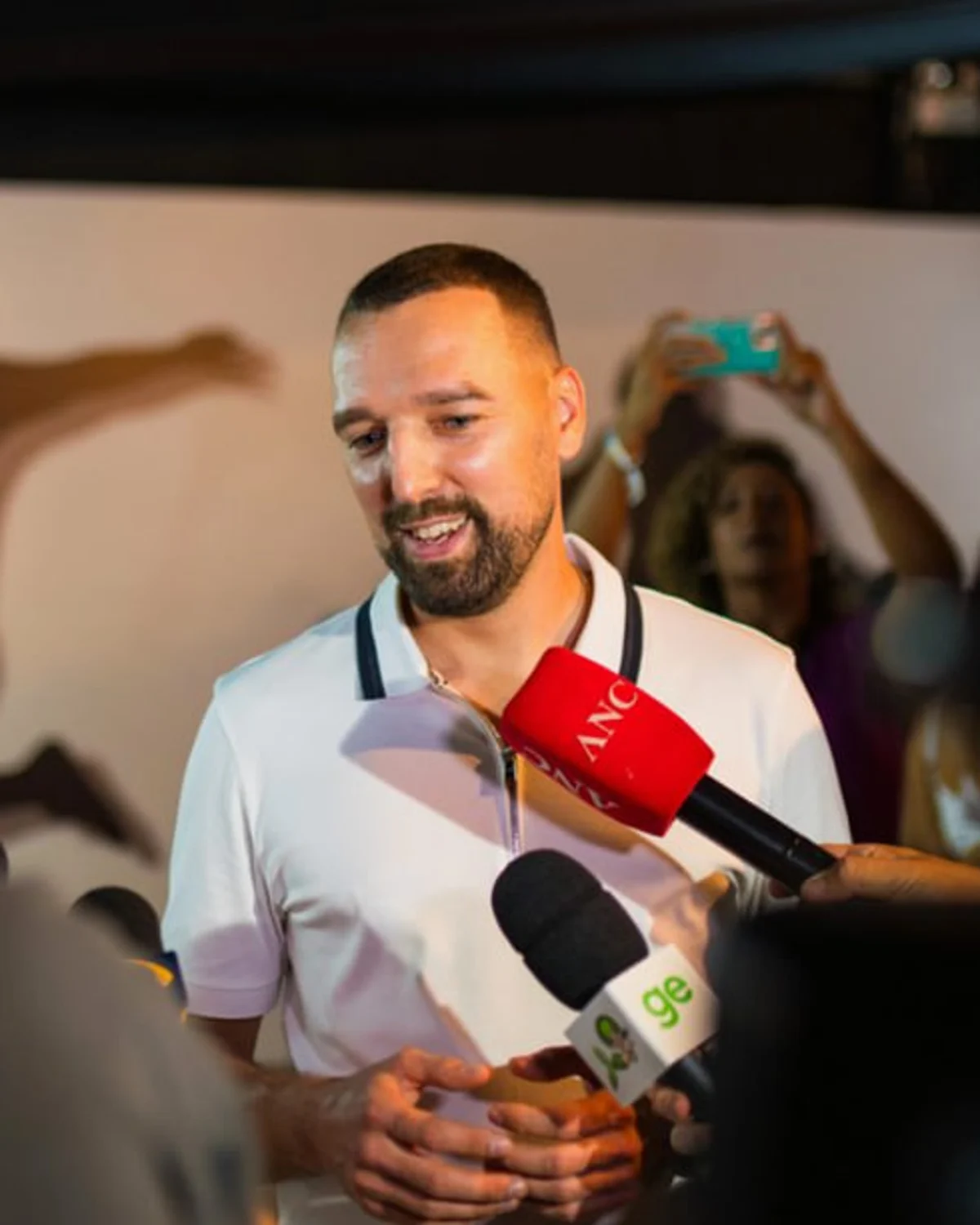 Dmitry Saksonov on stage at a Blockchain Sports event